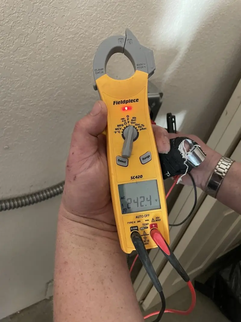 Voltage testing with clamp meter during Electrical Installation Services in Tualatin